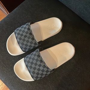 Vans slide sandal with black check print. Women’s size 10
